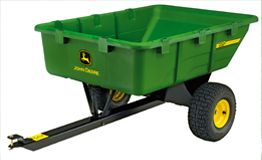 A green, 280 litre capacity utility cart designed to be towed by the X300 mini tractor
